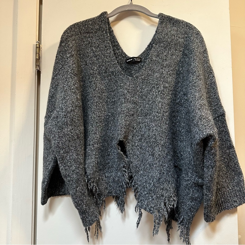 Frayed dark gray sweater